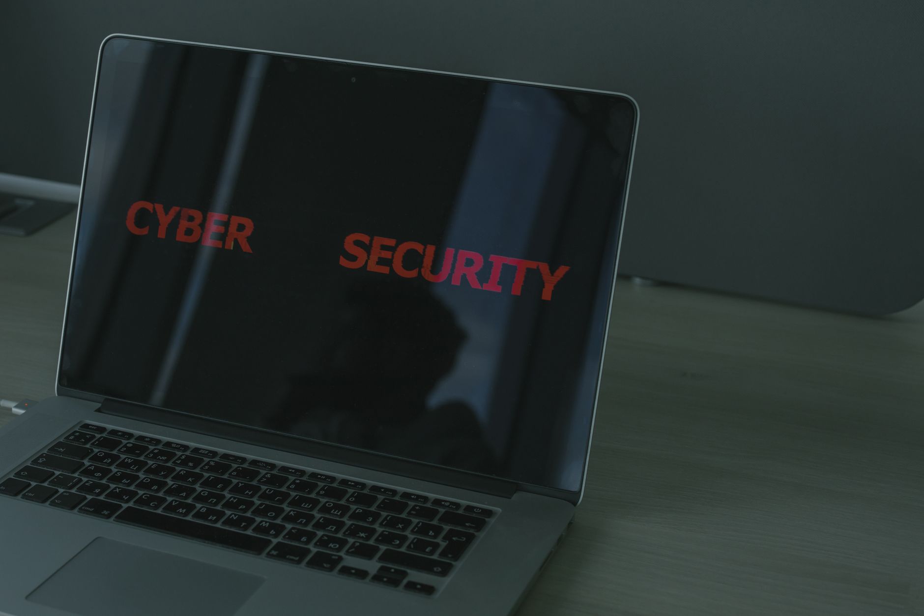 A laptop screen with a padlock, standing in for everyday business security