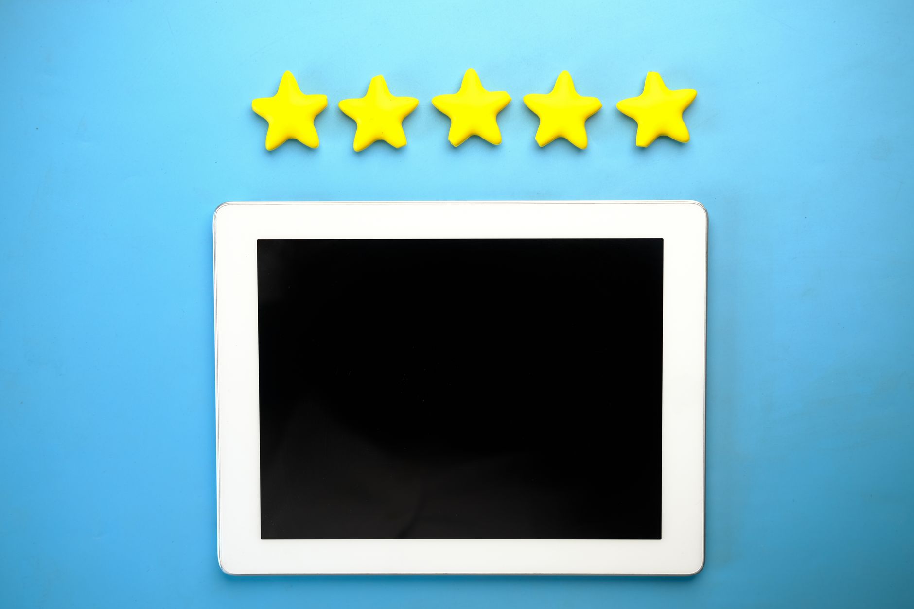 Five stars chalked on a blackboard
